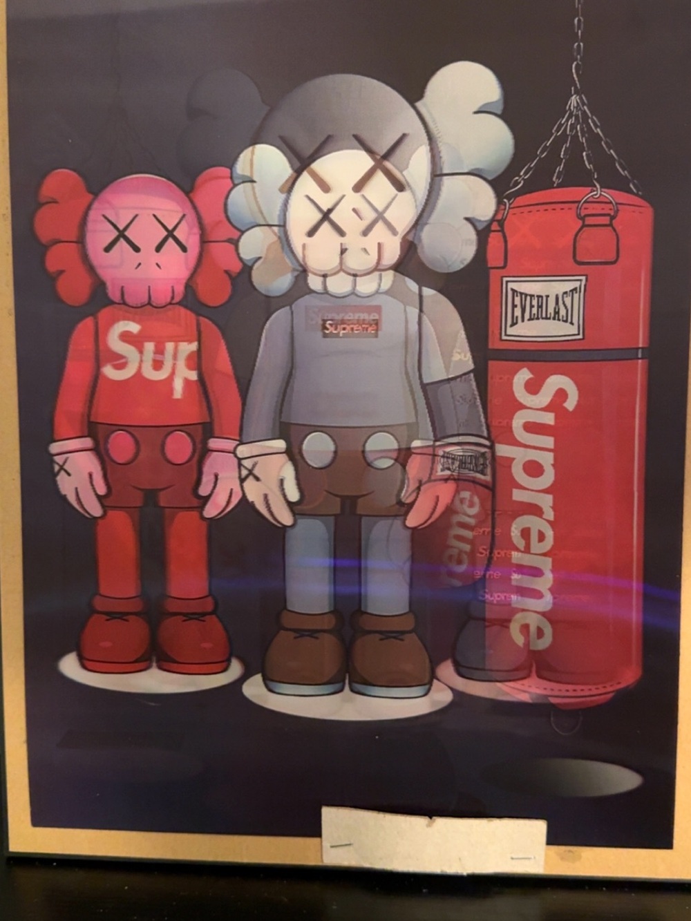 Supreme Poster with Red and Gray KAWS-Style Characters